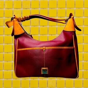 EUC Dooney & Bourke 1975 Rebecca Burgundy & Natural Leather
Hobo Bag